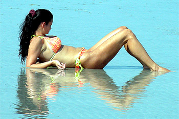 Sunbathing in the Surf at Crandon Beach